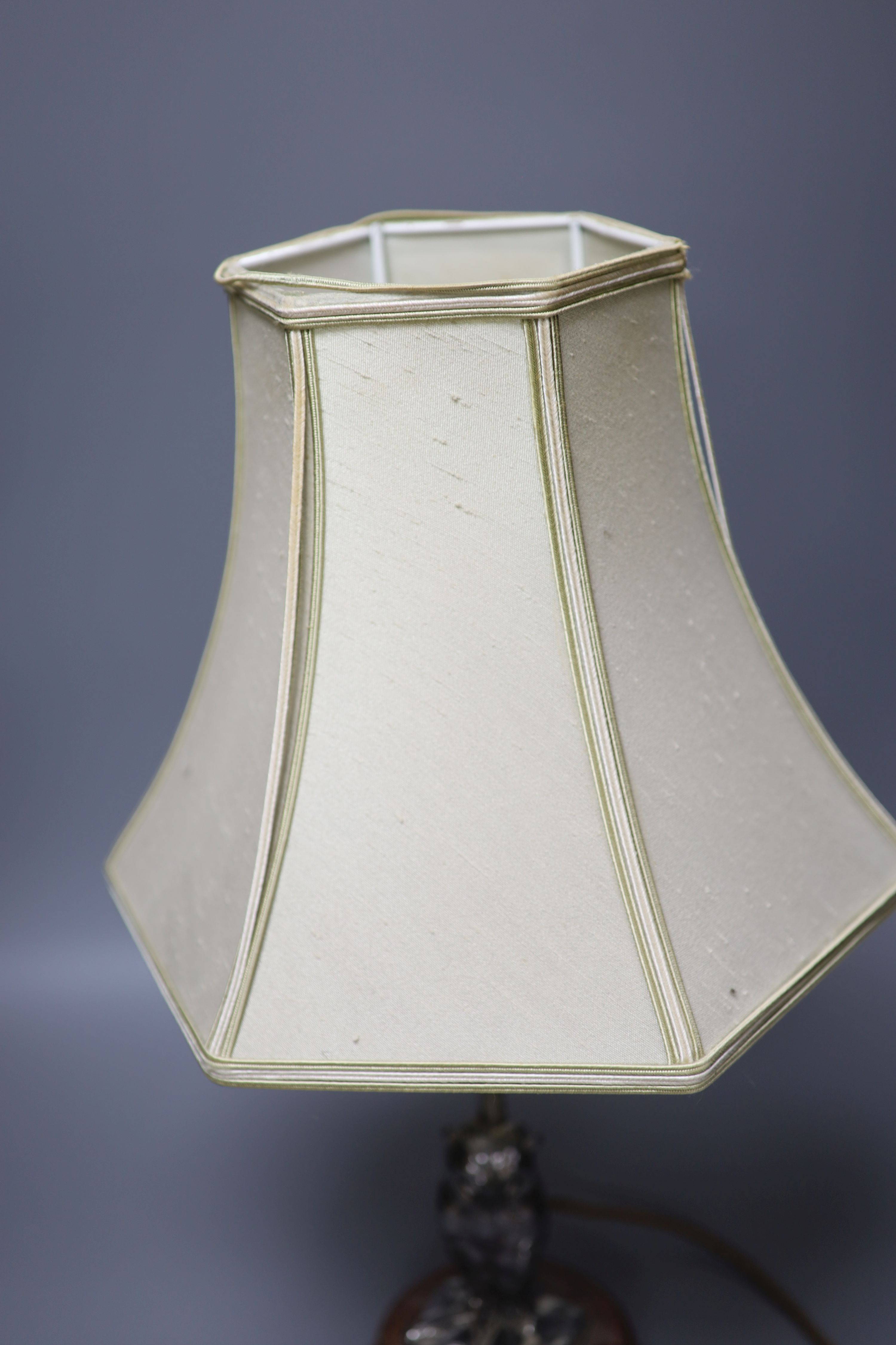 An early 20th century silver plated owl table lamp and shade, overall height 50cm